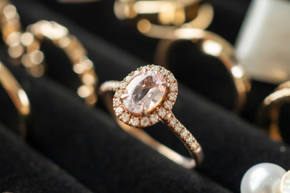 Gold jewelry diamond rings show in luxury retail store display showcase