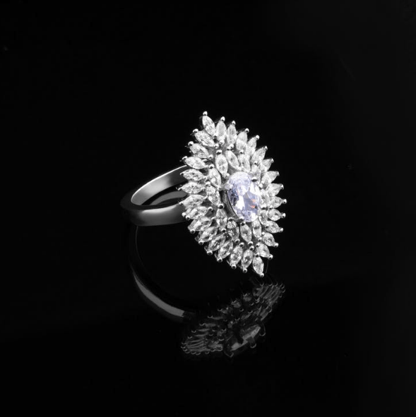 grayscale-photography-of-a-ring-with-diamonds