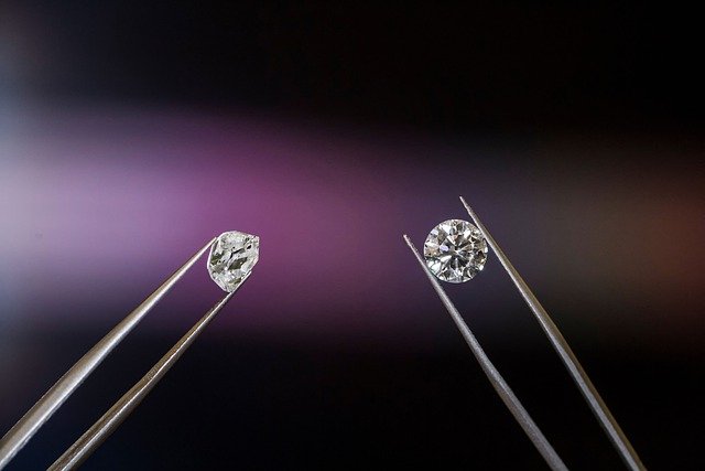 Two diamonds held up by lab apparatus