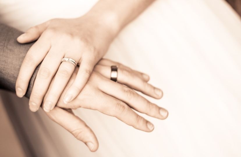 hands-couple-rings-wedding-bride
