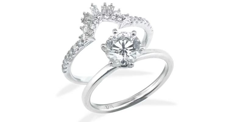 a white gold ring with a heart-shaped diamond
